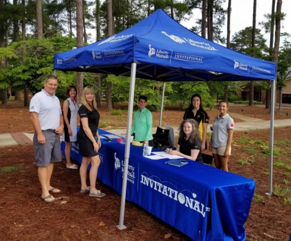 Registration table at the Liberty Mutual Golf Tournament